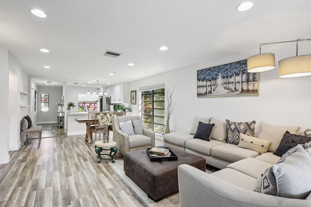 living room featuring light wood-type flooring