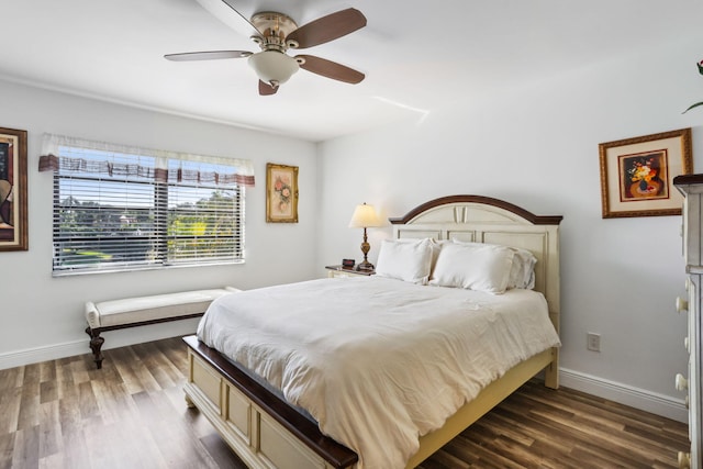 bedroom featuring dark hardwood / wood-style floors and ceiling fan