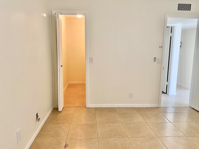 view of tiled spare room