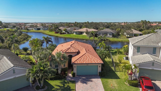 bird's eye view with a water view