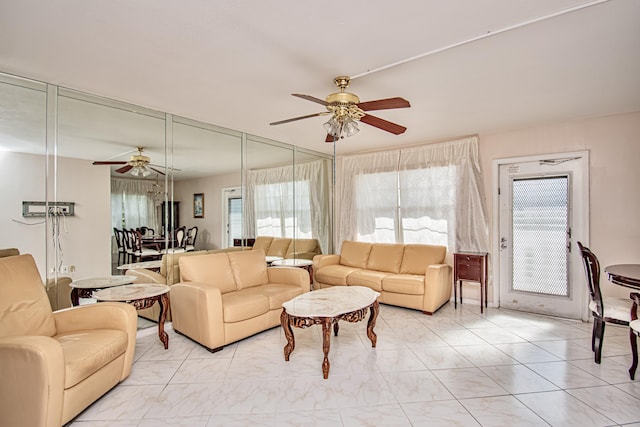 living room with ceiling fan