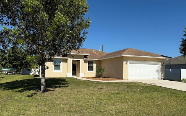 single story home with a front yard and a garage