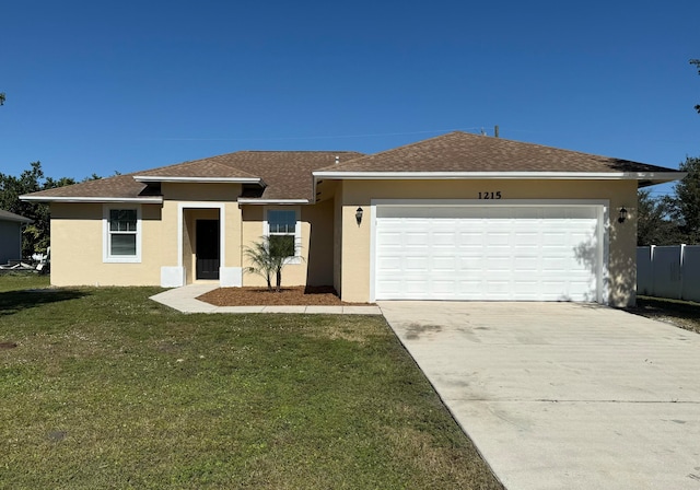 ranch-style home featuring a garage and a front lawn