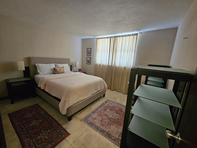 bedroom with a textured ceiling