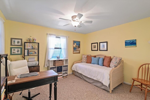 bedroom with ceiling fan and light colored carpet