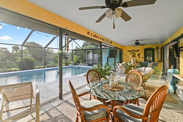 view of pool with ceiling fan