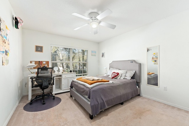 2538 12th Sq SW, Vero Beach, FL 32968 - bedroom with ceiling fan and light carpet