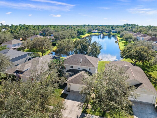 2538 12th Sq SW, Vero Beach, FL 32968 - rear view of property with a lawn and a sunroom