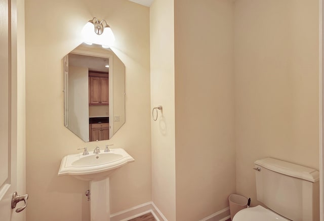 bathroom featuring toilet