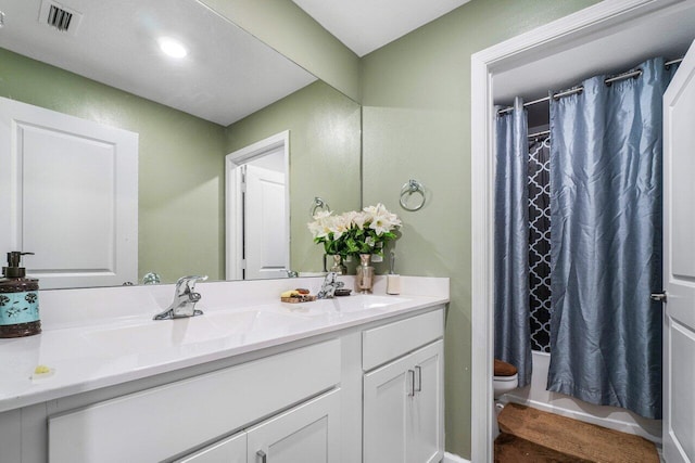 full bathroom with toilet, vanity, and shower / bath combination with curtain