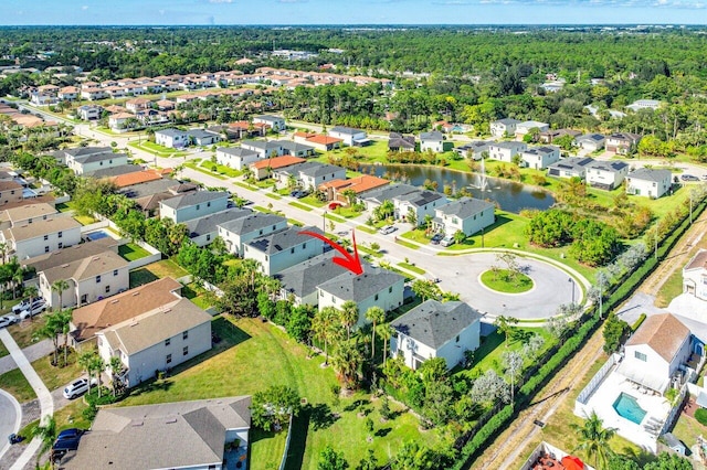 drone / aerial view featuring a water view