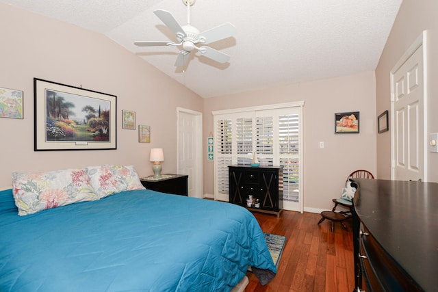 bedroom featuring access to exterior, dark wood-type flooring, baseboards, lofted ceiling, and a ceiling fan