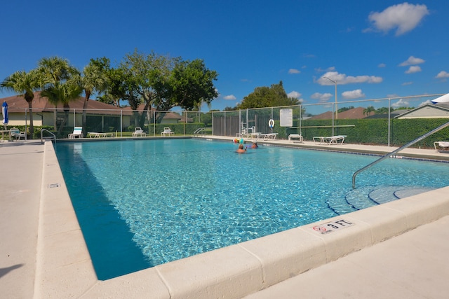 pool featuring fence