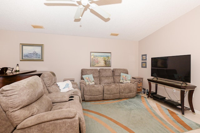 living room with visible vents and ceiling fan