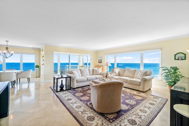 living room with a chandelier, a water view, and crown molding