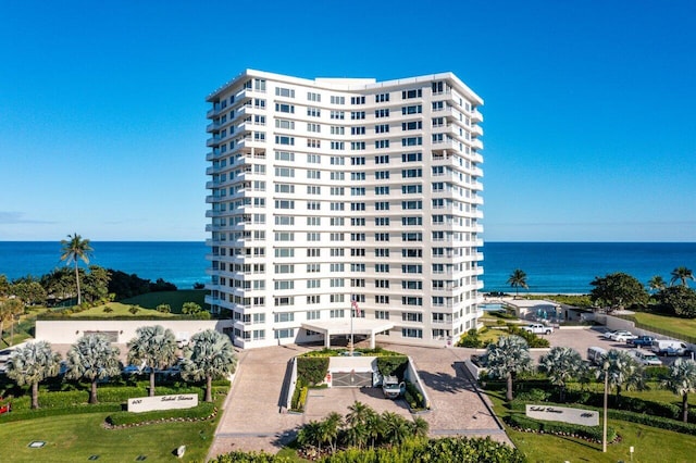 view of building exterior featuring a water view