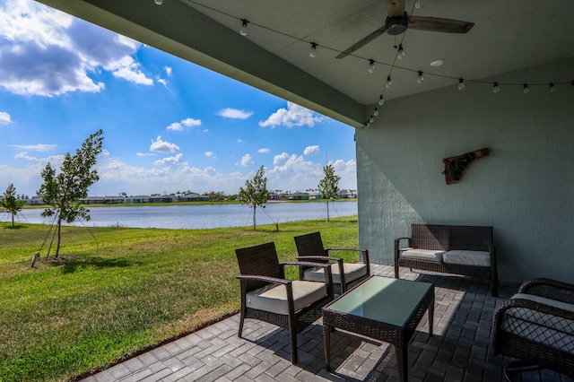 view of patio / terrace with an outdoor hangout area, a water view, and ceiling fan