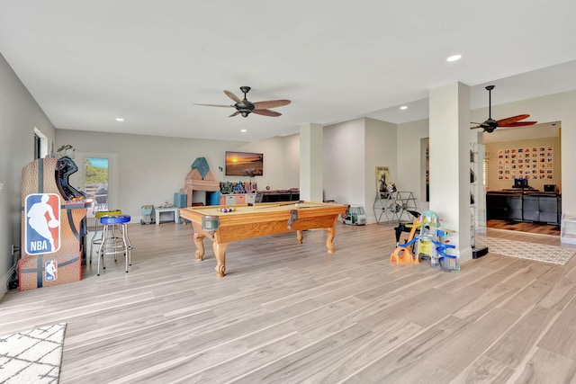 rec room with ceiling fan, light hardwood / wood-style floors, and pool table