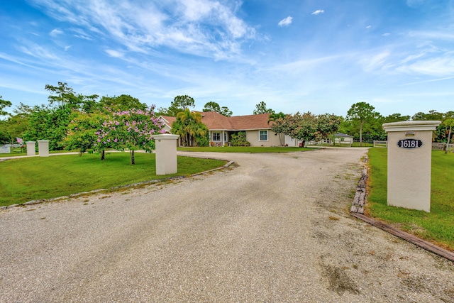 view of front of property with a front lawn