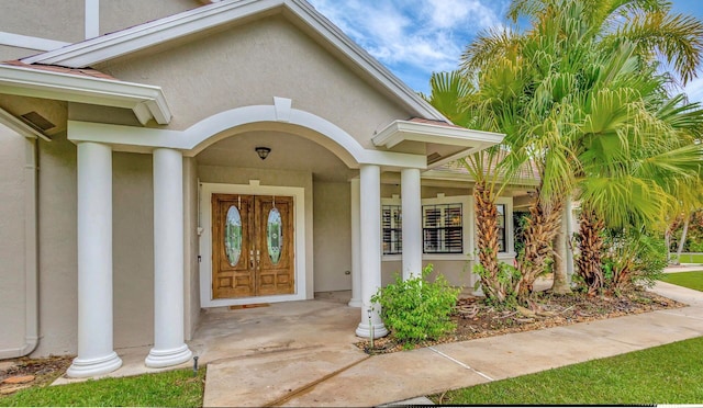 doorway to property featuring a porch