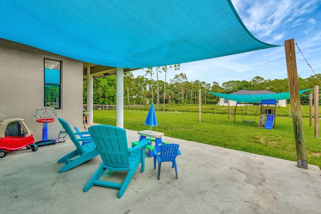 view of patio featuring a playground