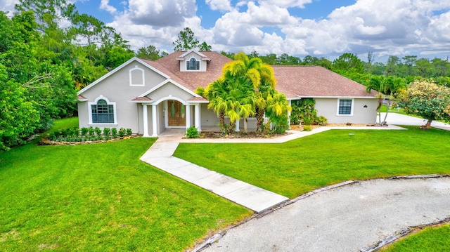 view of front of home with a front lawn