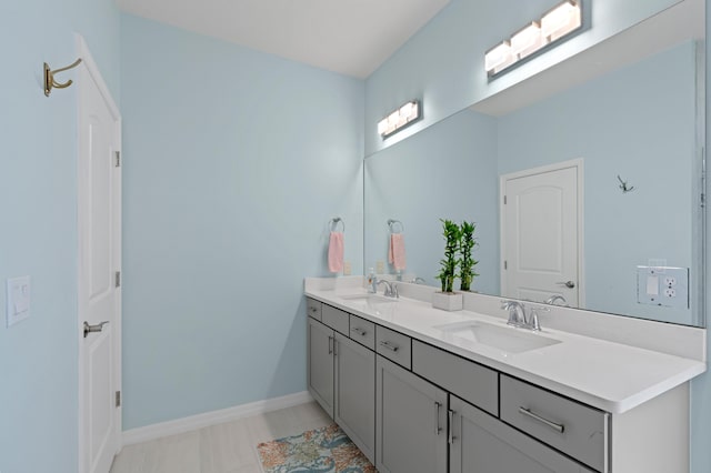 bathroom featuring tile patterned floors and vanity