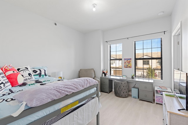 bedroom featuring light hardwood / wood-style flooring