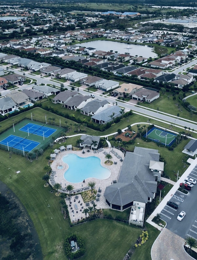 birds eye view of property featuring a water view