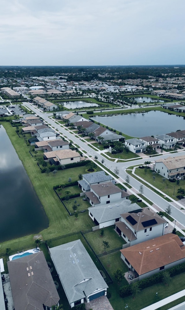 aerial view featuring a water view