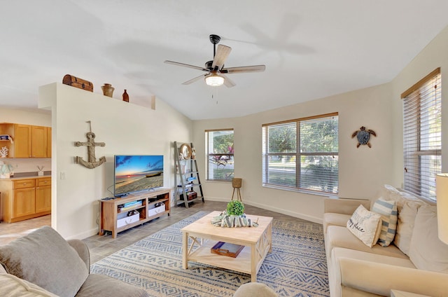 tiled living room featuring ceiling fan and vaulted ceiling