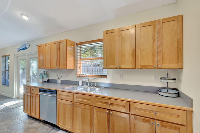 kitchen featuring french doors, stainless steel dishwasher, a wealth of natural light, and sink