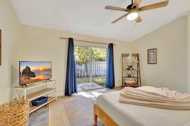 bedroom with ceiling fan, access to exterior, and vaulted ceiling