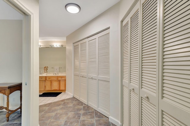 corridor featuring light tile patterned flooring