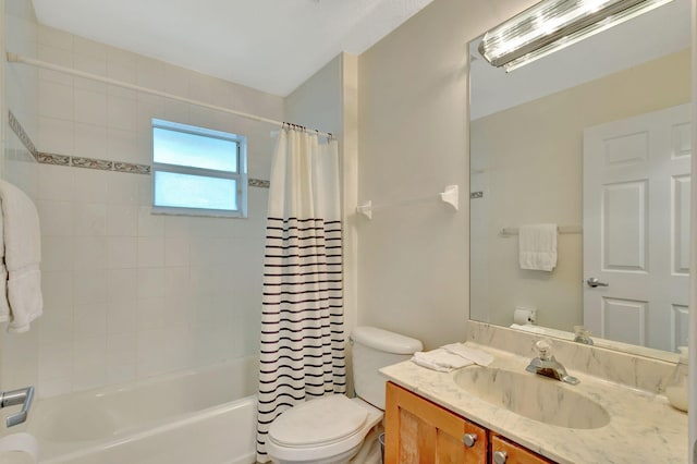 full bathroom with shower / bath combo with shower curtain, vanity, and toilet