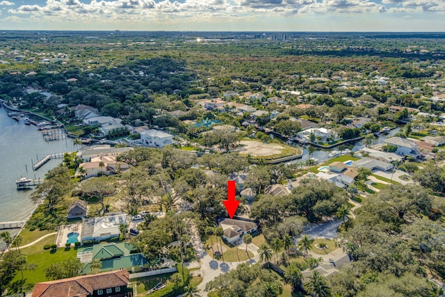 birds eye view of property featuring a water view