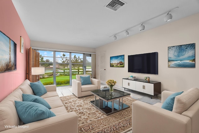 living room featuring track lighting