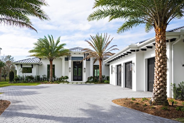 view of front of property with a garage