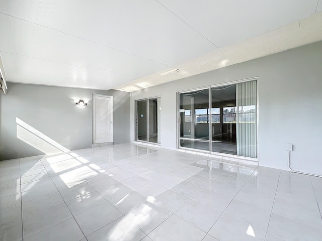 view of tiled spare room