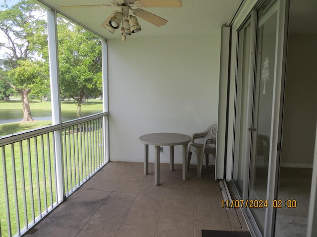 balcony featuring ceiling fan