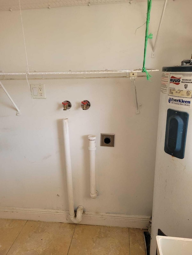 laundry area featuring electric water heater, washer hookup, and hookup for an electric dryer