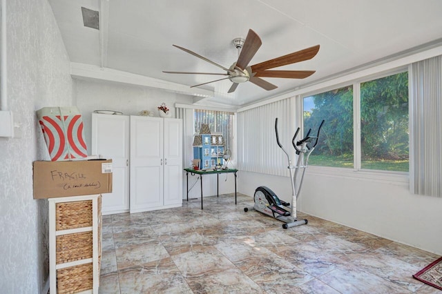 workout room featuring ceiling fan