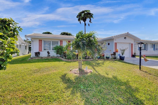 single story home with a garage, driveway, a front yard, and stucco siding