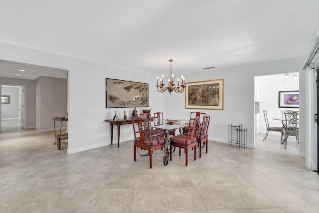 dining area featuring a chandelier