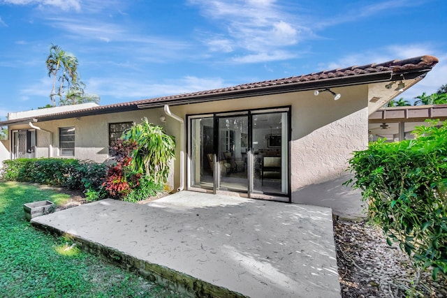 rear view of property with a patio area