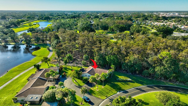 drone / aerial view featuring a water view