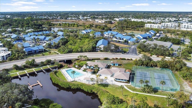 bird's eye view with a water view and a residential view