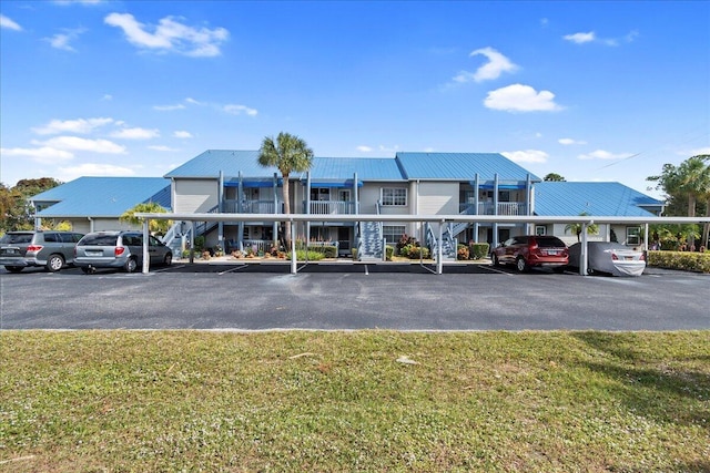 view of property with covered parking