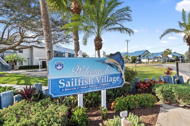 community / neighborhood sign featuring a residential view