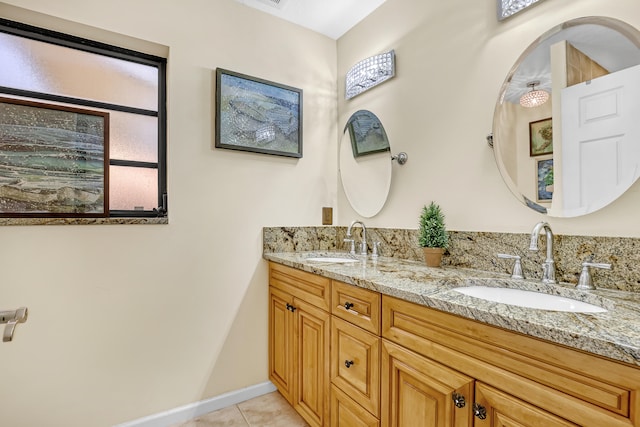 bathroom with vanity and tile patterned flooring